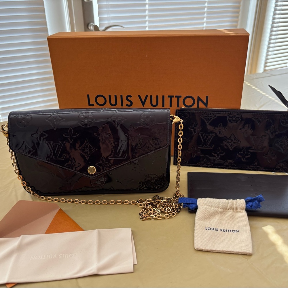 Louis Vuitton Black Monogram Wristlet with Gold Chain